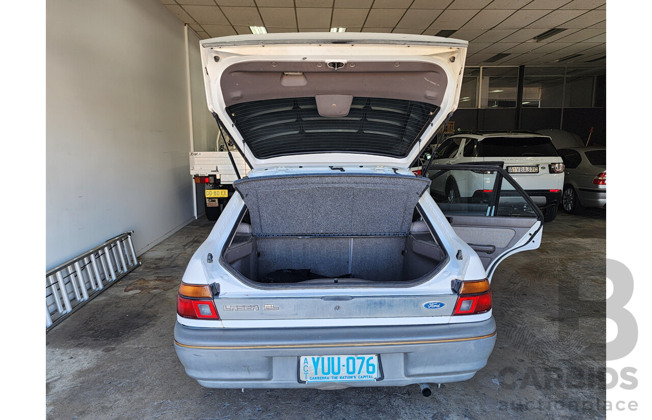 2/1991 Ford Laser GL KF 4d Sedan White 1.6L