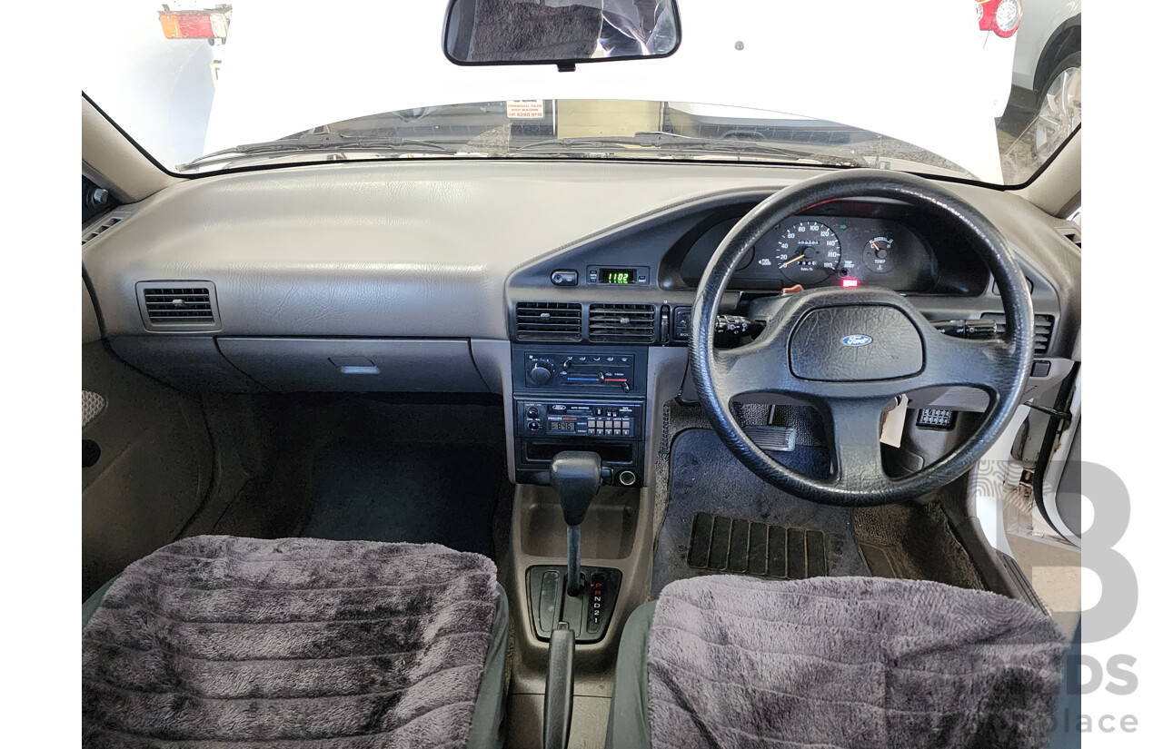 2/1991 Ford Laser GL KF 4d Sedan White 1.6L