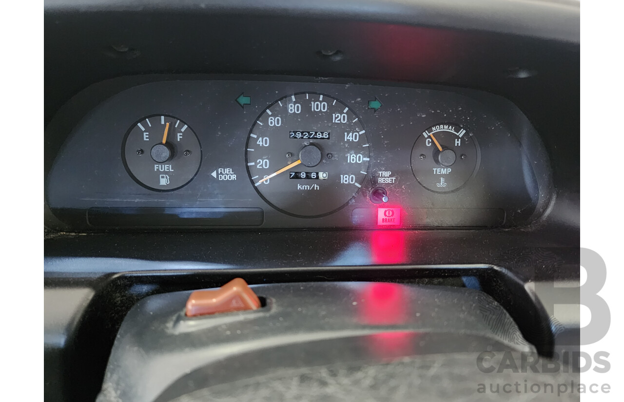 2/1991 Ford Laser GL KF 4d Sedan White 1.6L