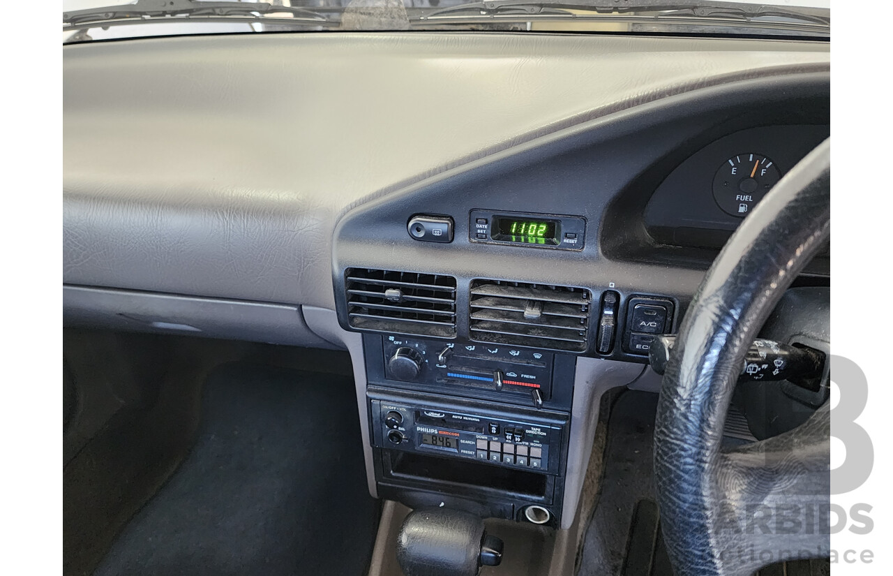 2/1991 Ford Laser GL KF 4d Sedan White 1.6L