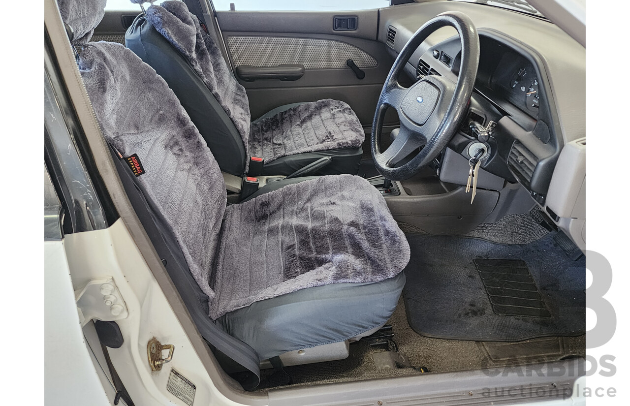 2/1991 Ford Laser GL KF 4d Sedan White 1.6L