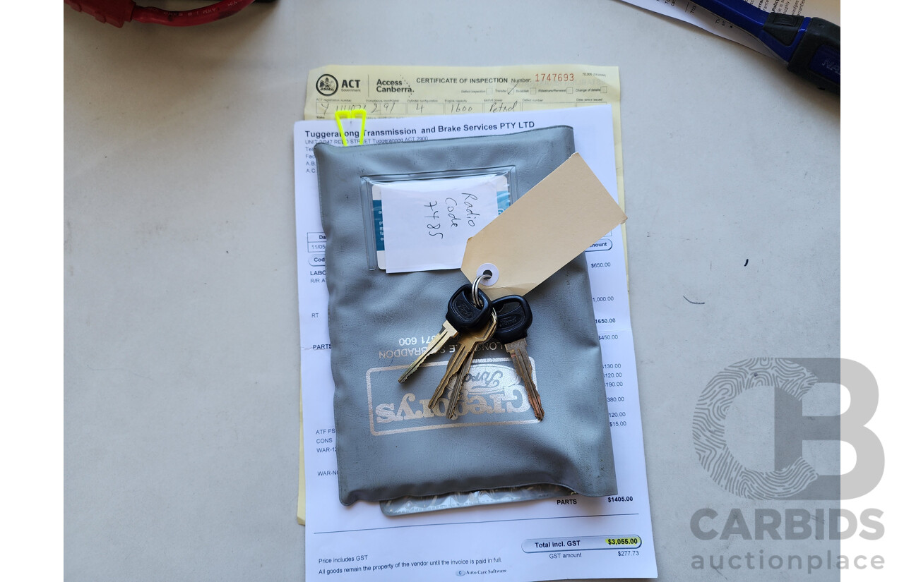 2/1991 Ford Laser GL KF 4d Sedan White 1.6L