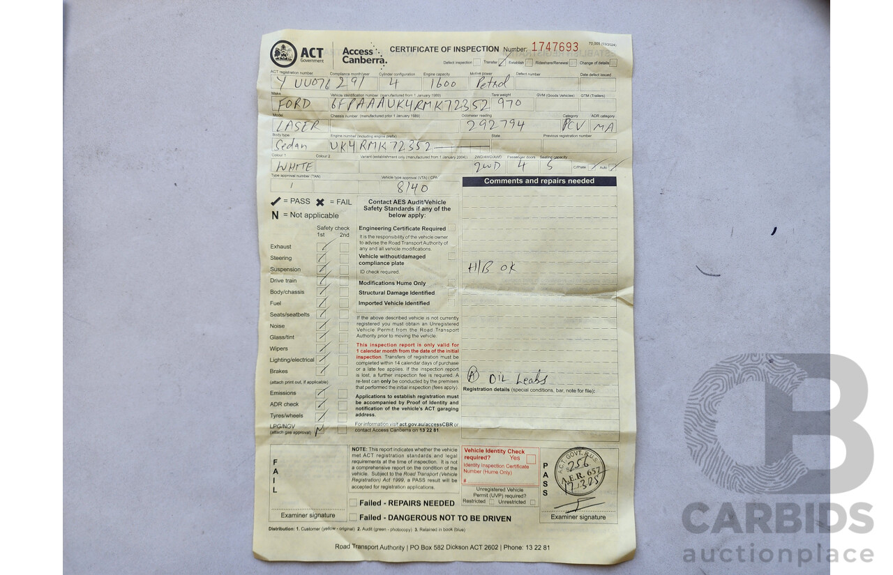 2/1991 Ford Laser GL KF 4d Sedan White 1.6L