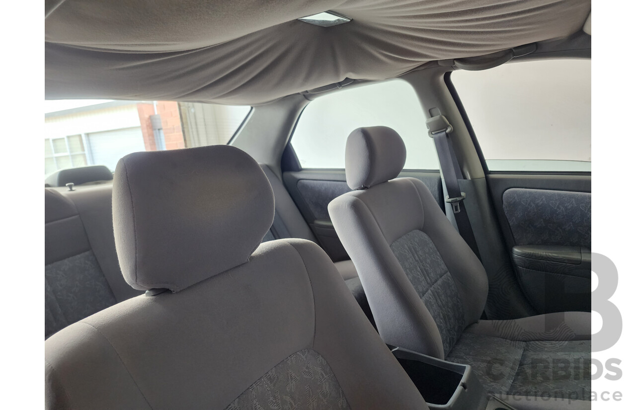 4/1999 Toyota Camry Conquest MCV20R 4d Sedan White 3.0L