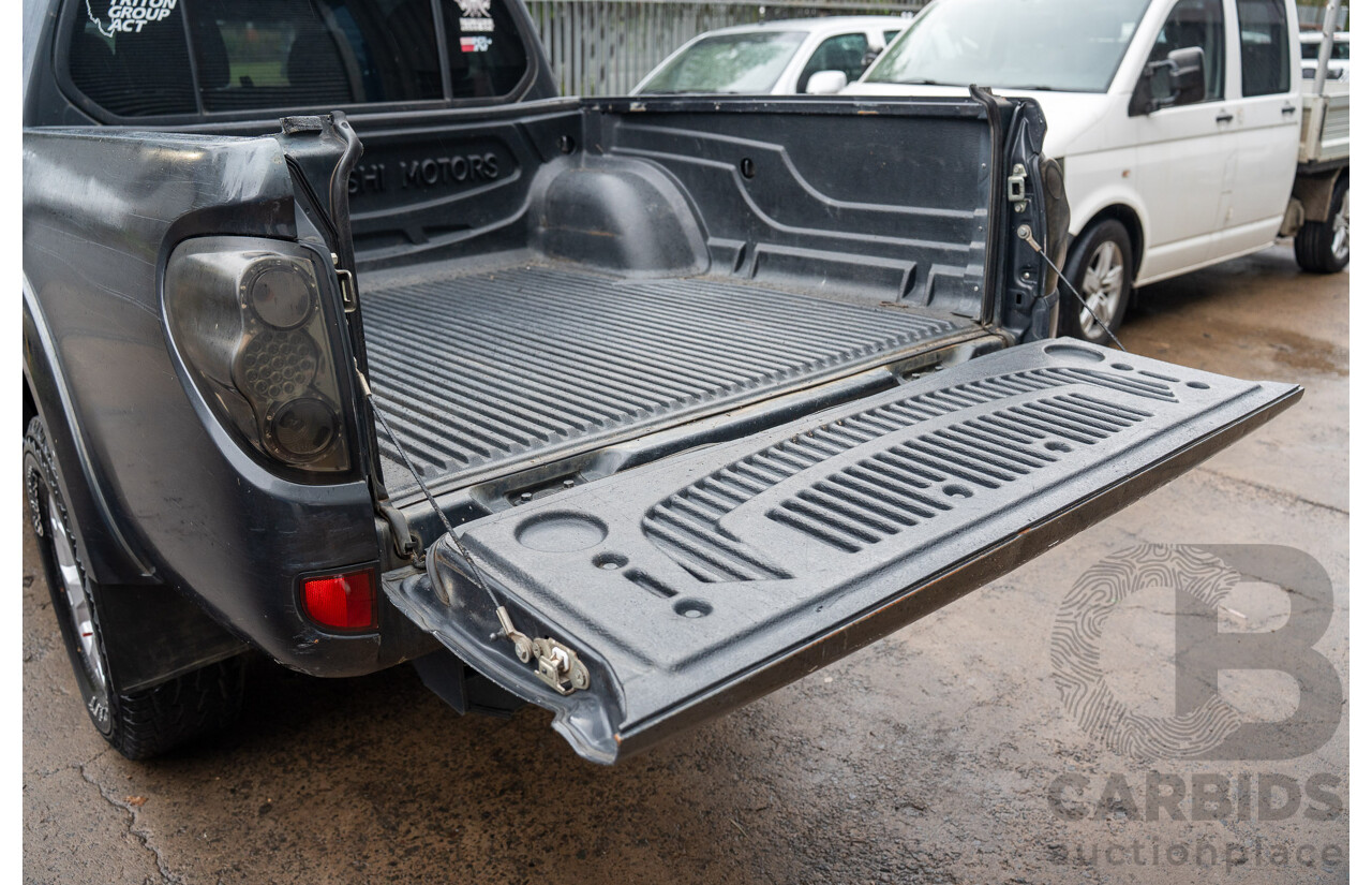 4/2014 Mitsubishi Triton GLX-R (4x4) MN MY15 Double Cab Utility Black Pearl Turbo Diesel 2.5L