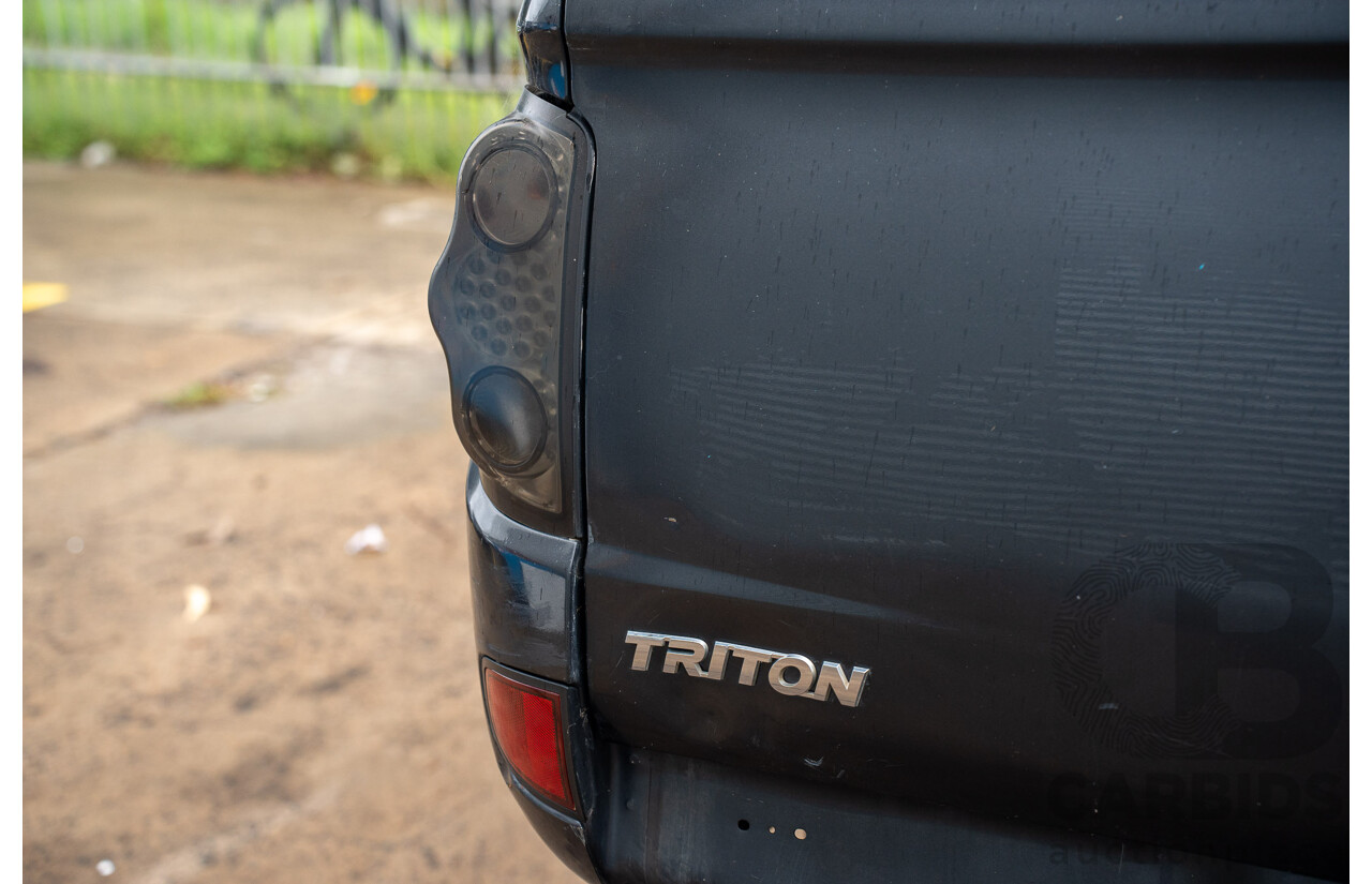 4/2014 Mitsubishi Triton GLX-R (4x4) MN MY15 Double Cab Utility Black Pearl Turbo Diesel 2.5L