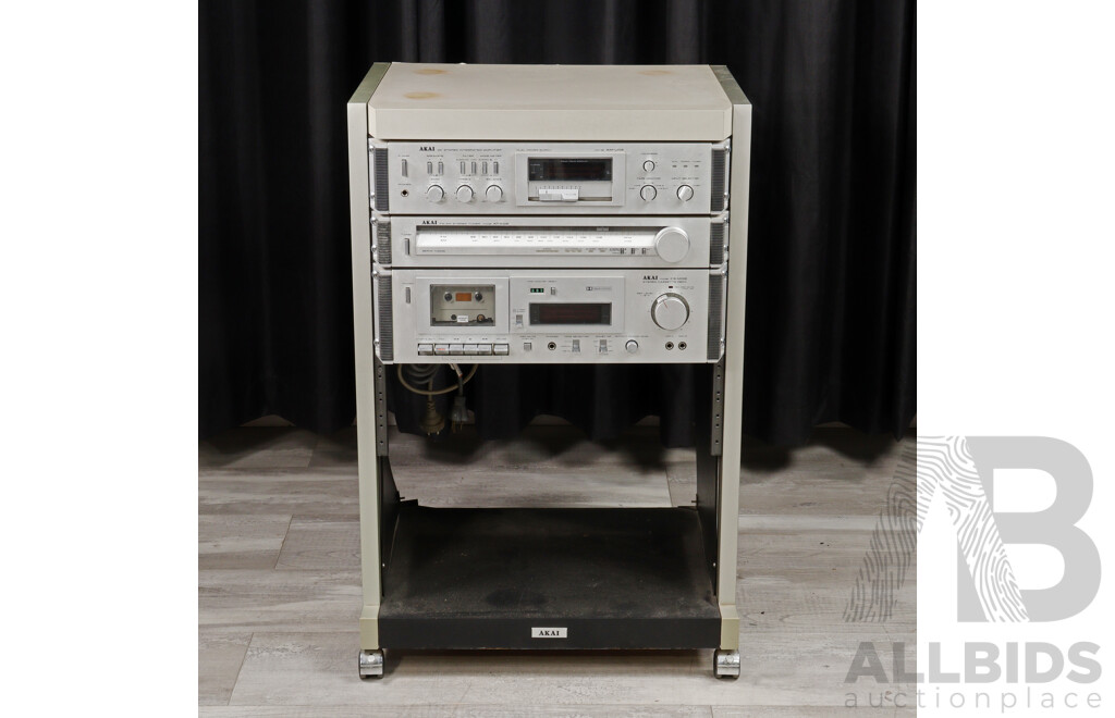 Akai Three Piece Rack Mounted Stereo System Comprising Dc Integrated Amplifier AM UO3, Stereo Tuner at KO2 & Stereo Casette Deck CS MO2, All in Akai Case