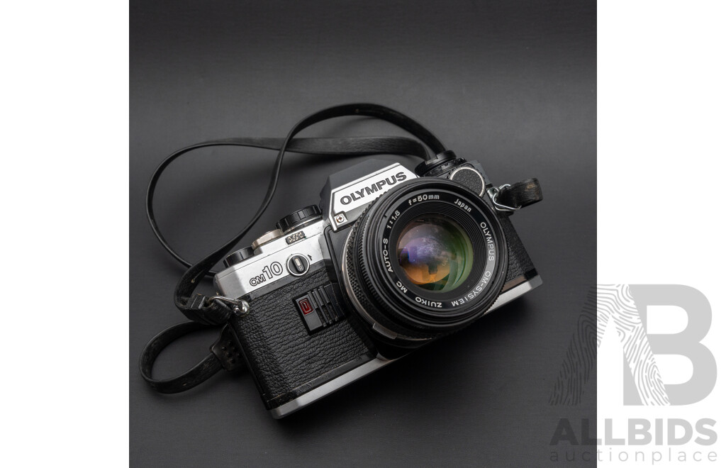 Olympus OM10 with a 50mm F/1.8 Lens and Praktica Super TL3 with Flexar Auto Zoom MC 80-200mm F/4.5 Lens