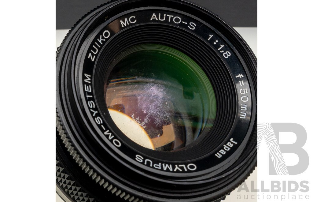 Olympus OM10 with a 50mm F/1.8 Lens and Praktica Super TL3 with Flexar Auto Zoom MC 80-200mm F/4.5 Lens