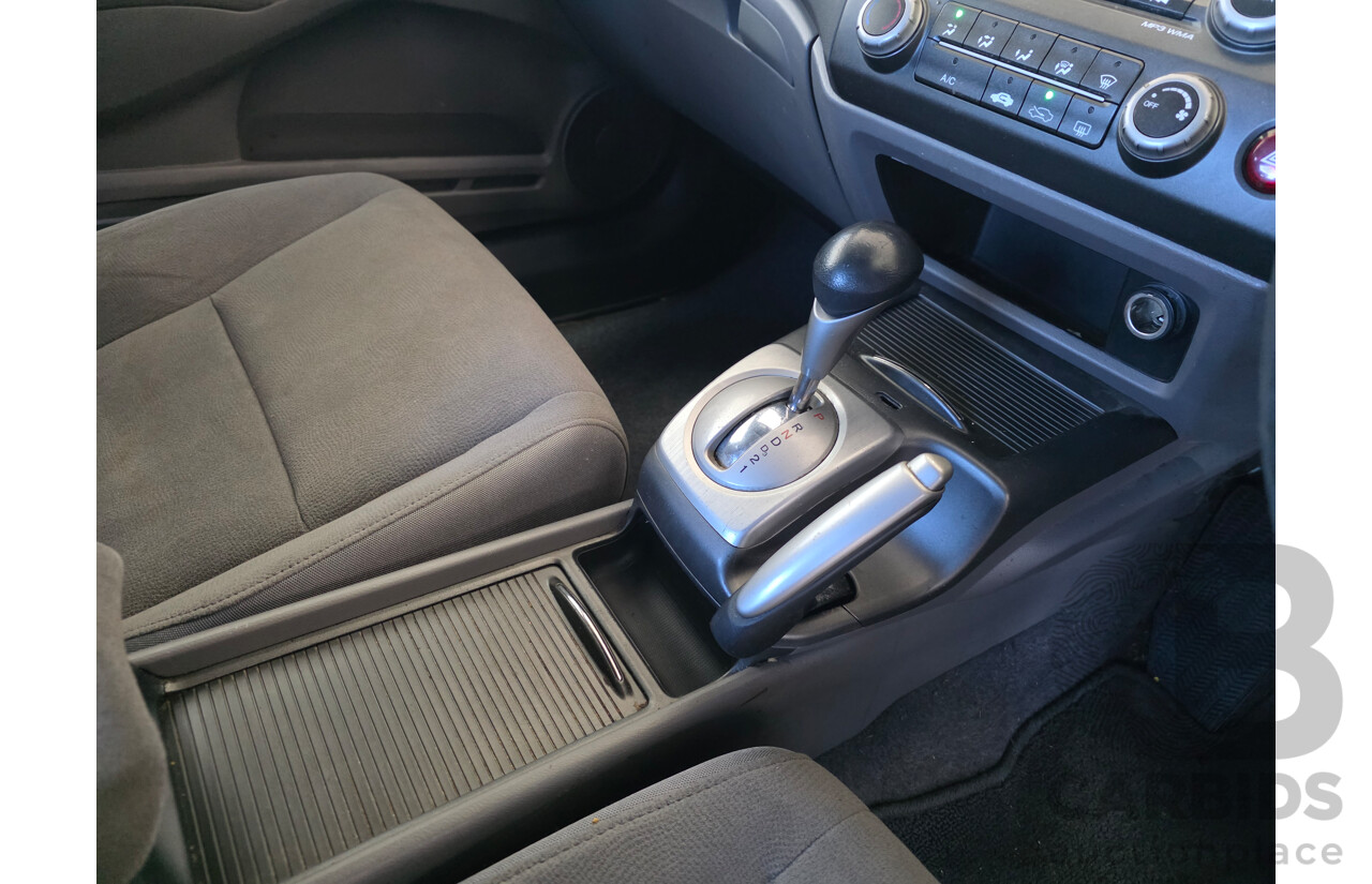 3/2006 Honda Civic VTi 40 4d Sedan Maroon 1.8L