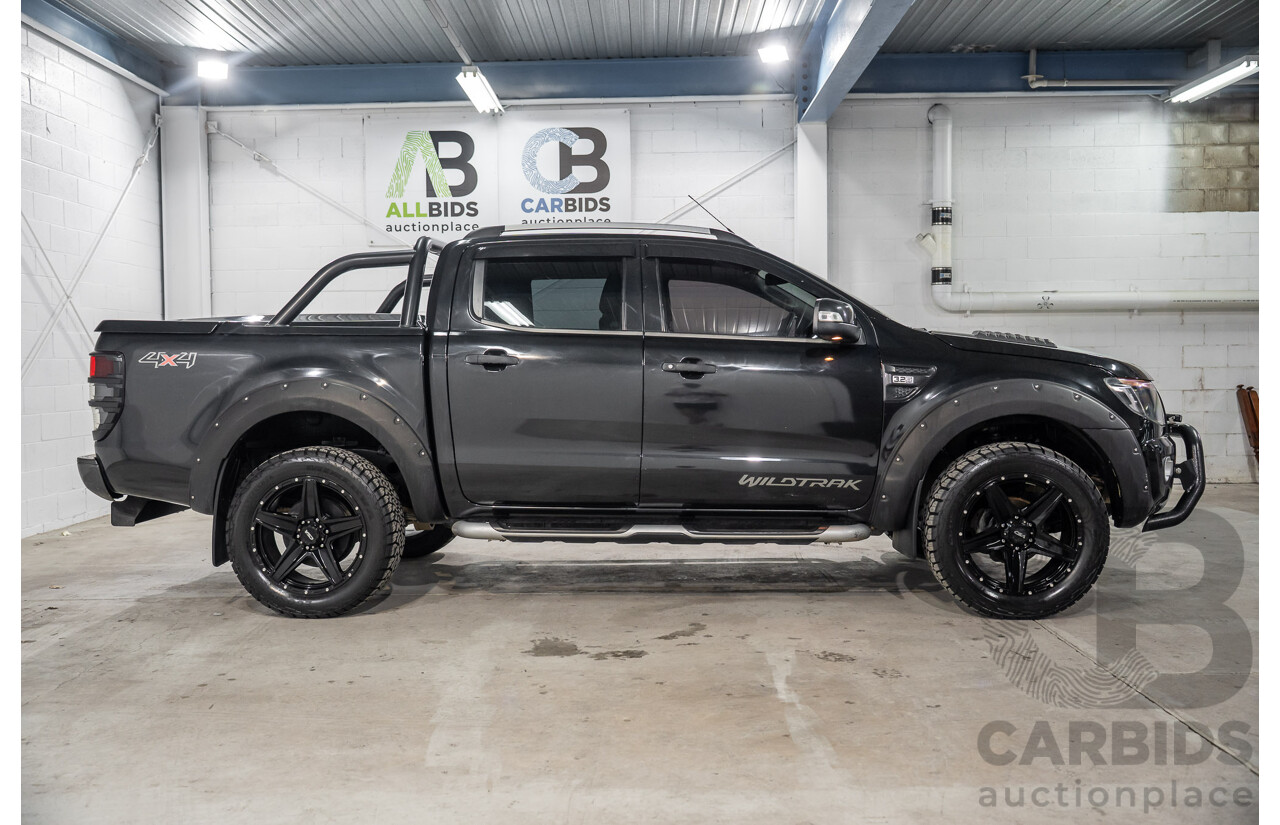 10/2013 Ford Ranger Wildtrak 3.2 (4x4) PX Crew Cab Utility Black Mica Turbo Diesel 3.2L