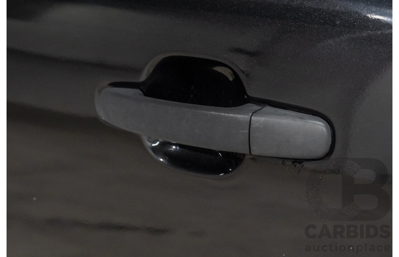 10/2013 Ford Ranger Wildtrak 3.2 (4x4) PX Crew Cab Utility Black Mica Turbo Diesel 3.2L