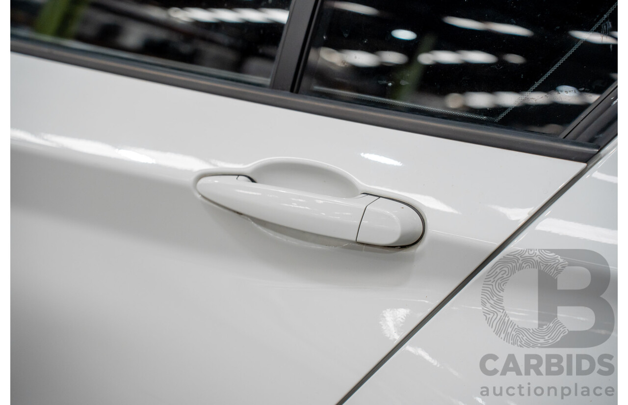 10/2014 BMW 116i SPORT LINE RWD F20 MY13 5D Hatchback White Turbo1.6L