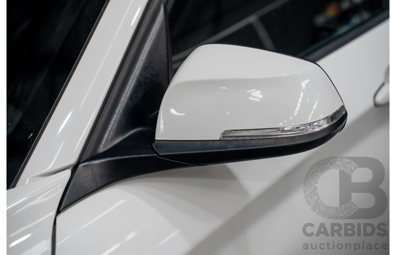 10/2014 BMW 116i SPORT LINE RWD F20 MY13 5D Hatchback White Turbo1.6L