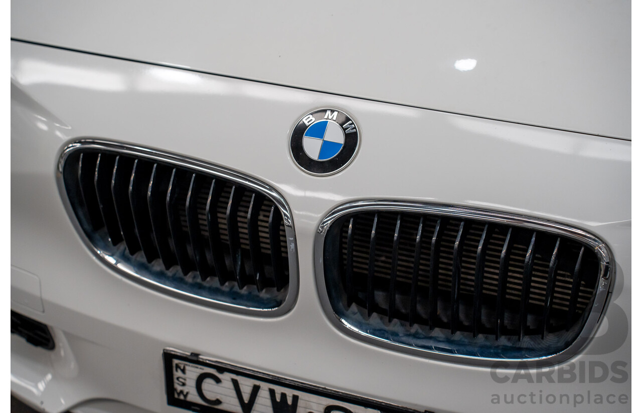 10/2014 BMW 116i SPORT LINE RWD F20 MY13 5D Hatchback White Turbo1.6L