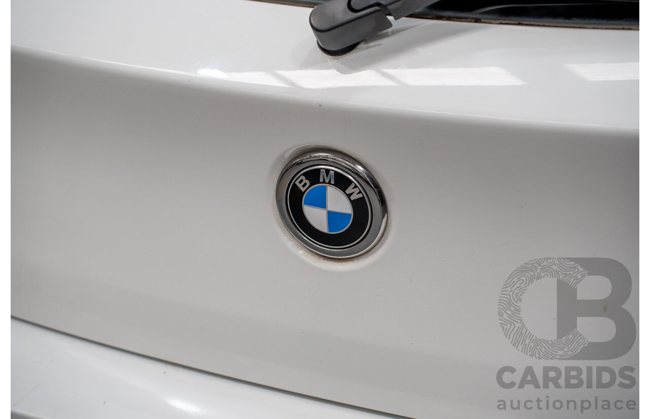 10/2014 BMW 116i SPORT LINE RWD F20 MY13 5D Hatchback White Turbo1.6L