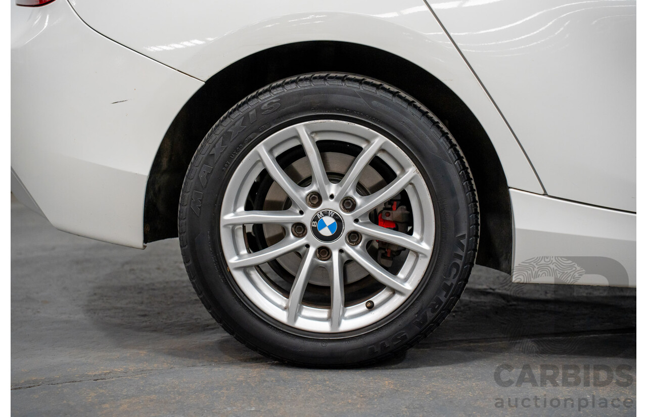 10/2014 BMW 116i SPORT LINE RWD F20 MY13 5D Hatchback White Turbo1.6L