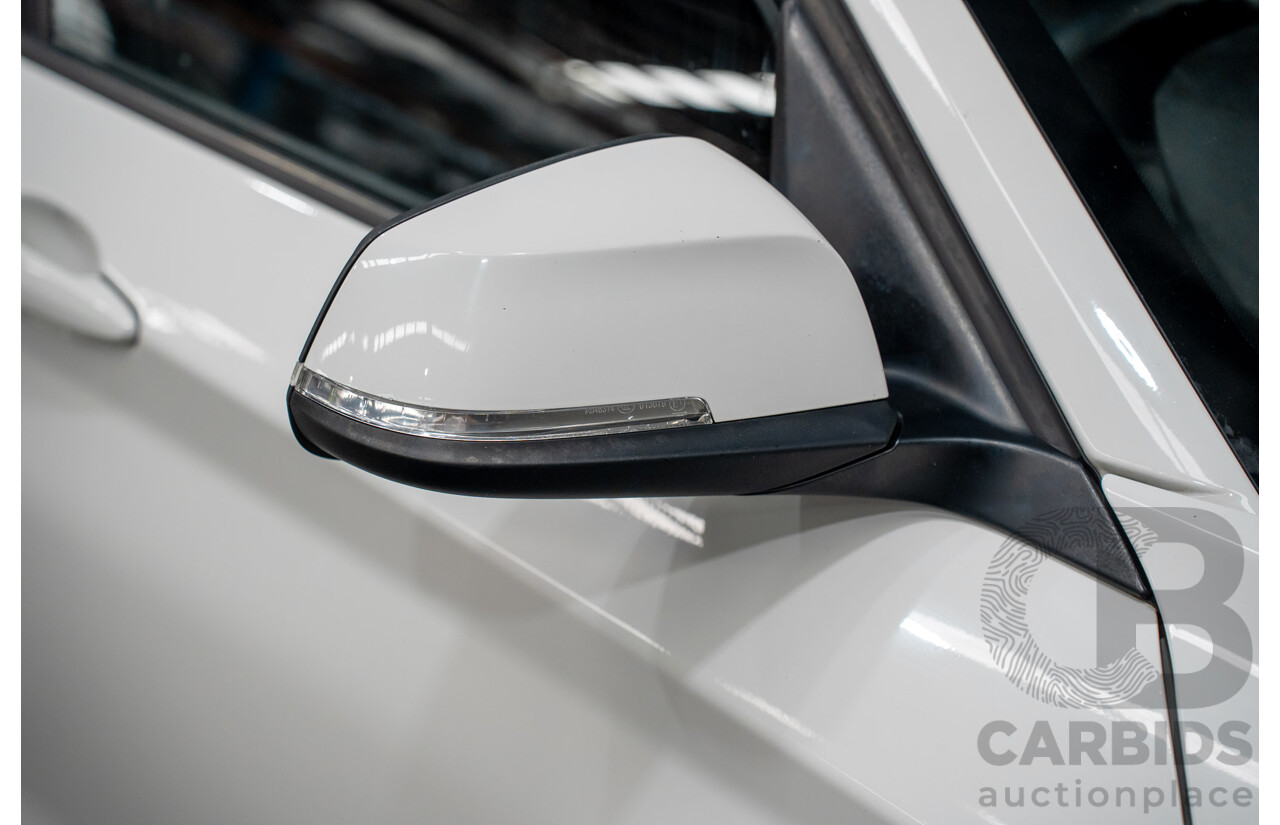 10/2014 BMW 116i SPORT LINE RWD F20 MY13 5D Hatchback White Turbo1.6L