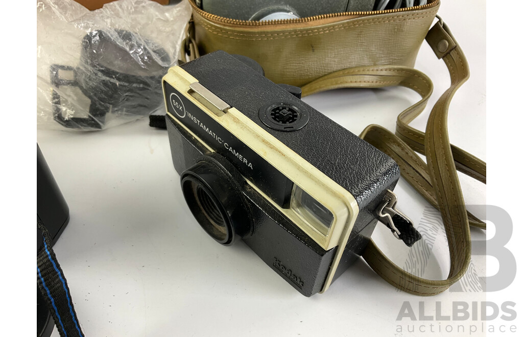 Collection of Vintage 35mm Cameras Including Canon QL17, Olympus AFL-S, Instamatic and Proskar Slide Projector with Original Box and Case