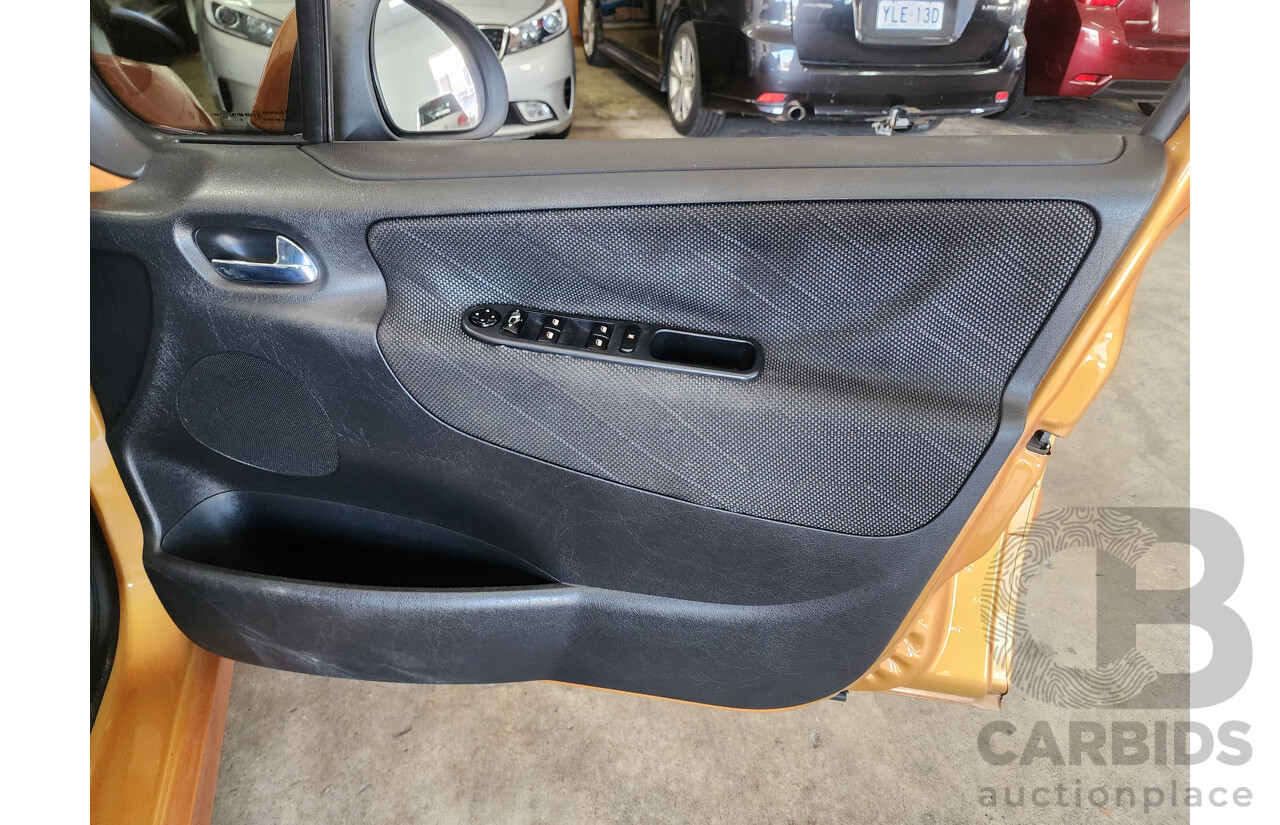 2/2009 Peugeot 207 XT  5d Hatchback Orange 1.6L