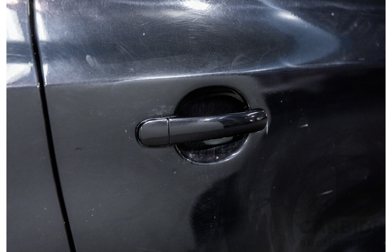 5/2011 Volkswagen Tiguan 125 TSI 5NC MY11 4d Wagon Deep Black Pearl Turbo 2.0L