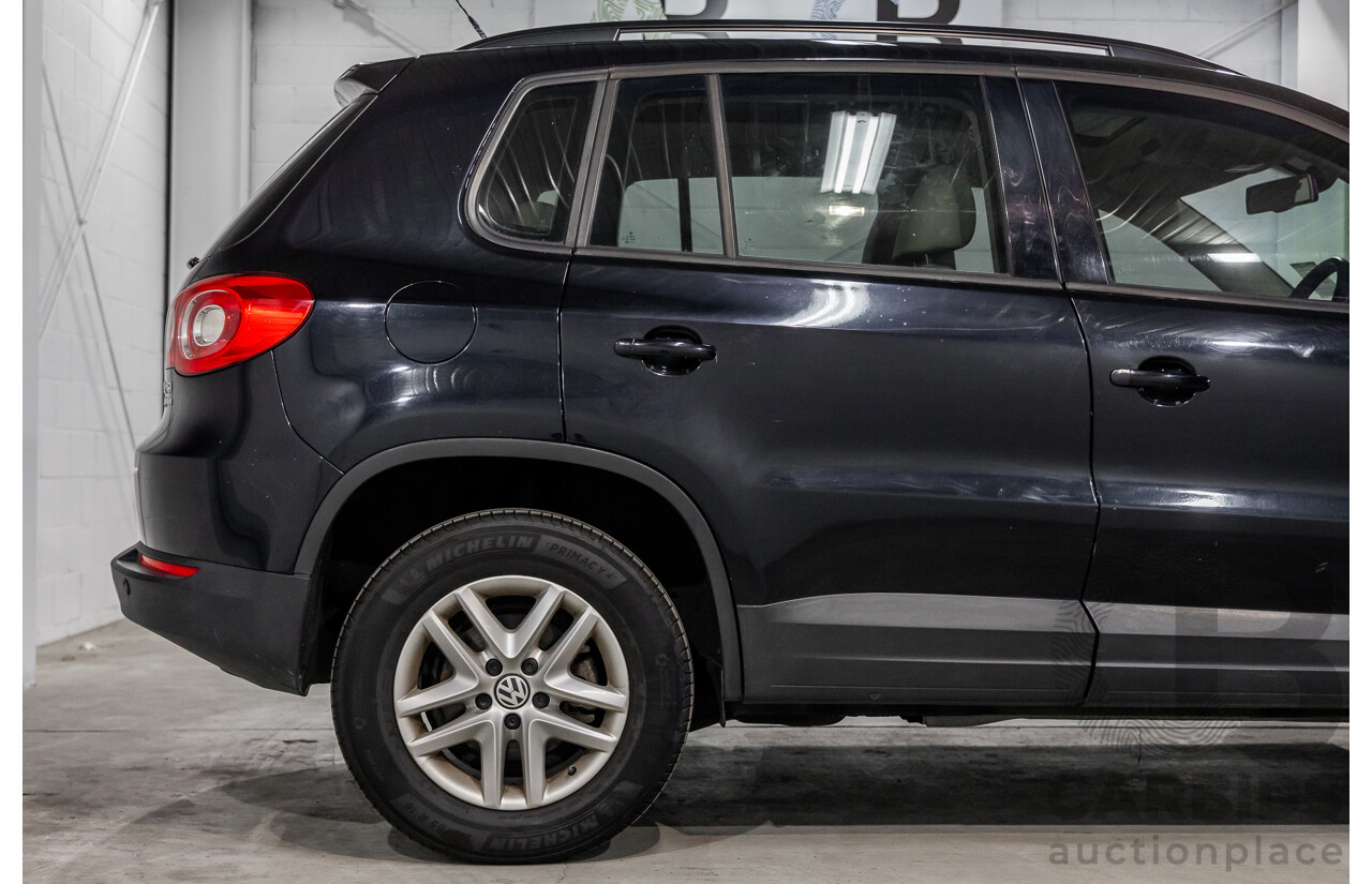 5/2011 Volkswagen Tiguan 125 TSI 5NC MY11 4d Wagon Deep Black Pearl Turbo 2.0L