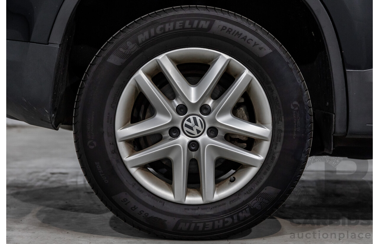 5/2011 Volkswagen Tiguan 125 TSI 5NC MY11 4d Wagon Deep Black Pearl Turbo 2.0L