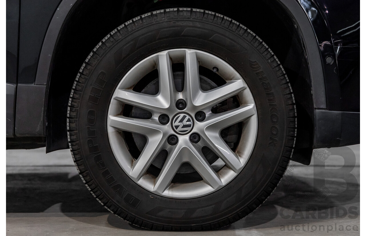 5/2011 Volkswagen Tiguan 125 TSI 5NC MY11 4d Wagon Deep Black Pearl Turbo 2.0L