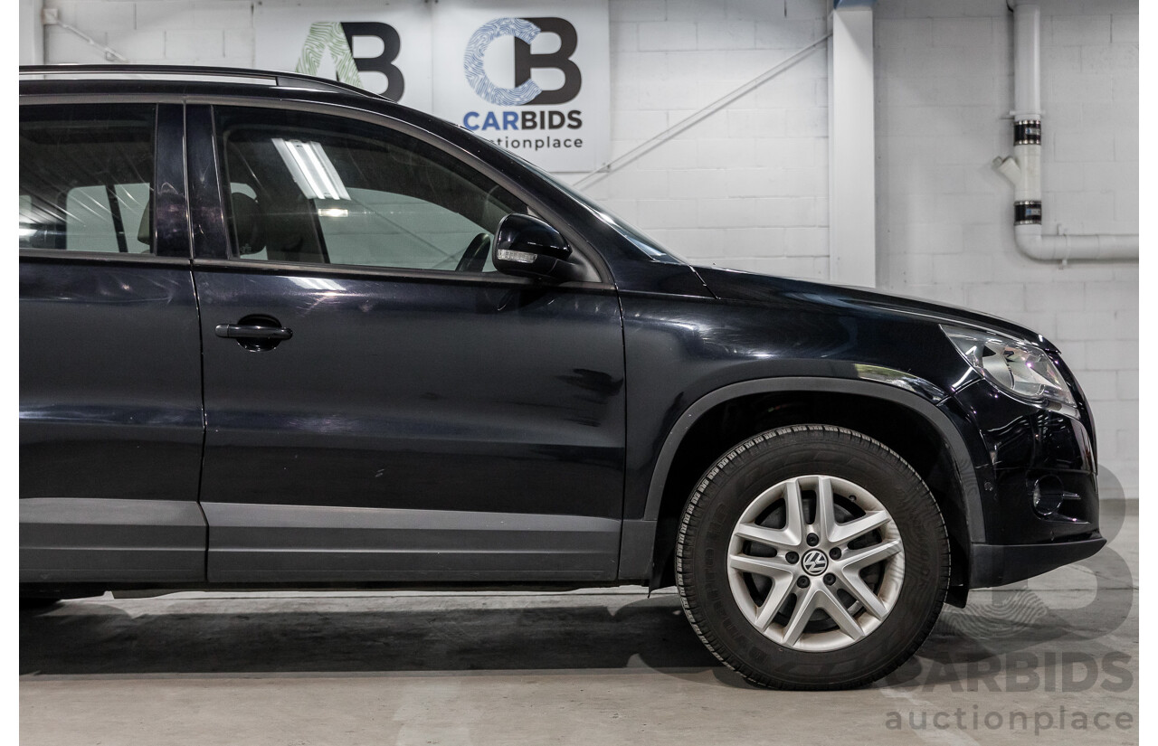 5/2011 Volkswagen Tiguan 125 TSI 5NC MY11 4d Wagon Deep Black Pearl Turbo 2.0L