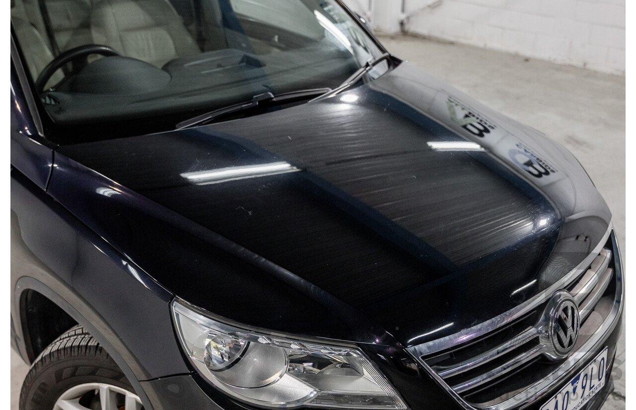 5/2011 Volkswagen Tiguan 125 TSI 5NC MY11 4d Wagon Deep Black Pearl Turbo 2.0L