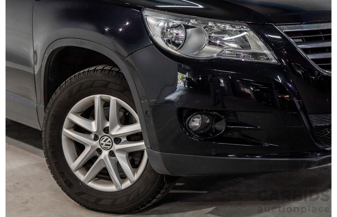 5/2011 Volkswagen Tiguan 125 TSI 5NC MY11 4d Wagon Deep Black Pearl Turbo 2.0L