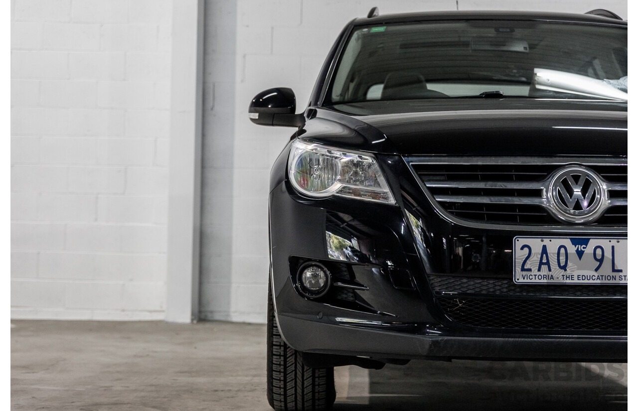 5/2011 Volkswagen Tiguan 125 TSI 5NC MY11 4d Wagon Deep Black Pearl Turbo 2.0L