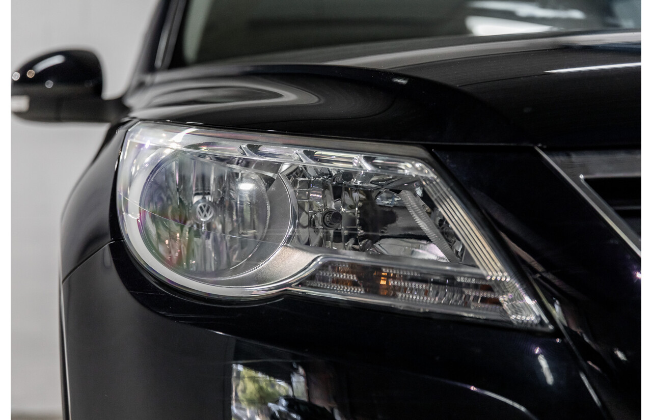 5/2011 Volkswagen Tiguan 125 TSI 5NC MY11 4d Wagon Deep Black Pearl Turbo 2.0L