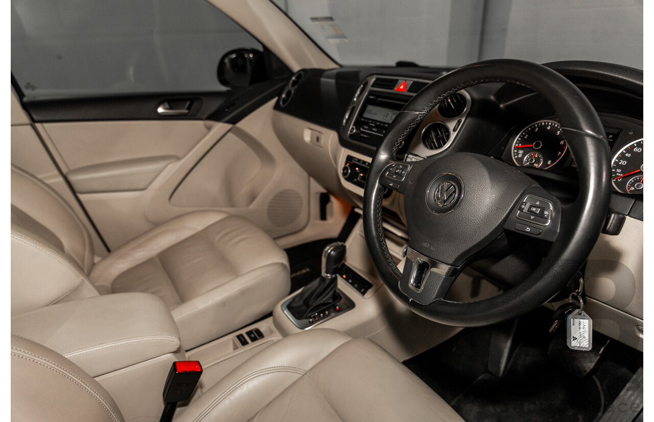 5/2011 Volkswagen Tiguan 125 TSI 5NC MY11 4d Wagon Deep Black Pearl Turbo 2.0L