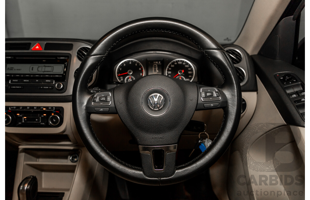 5/2011 Volkswagen Tiguan 125 TSI 5NC MY11 4d Wagon Deep Black Pearl Turbo 2.0L
