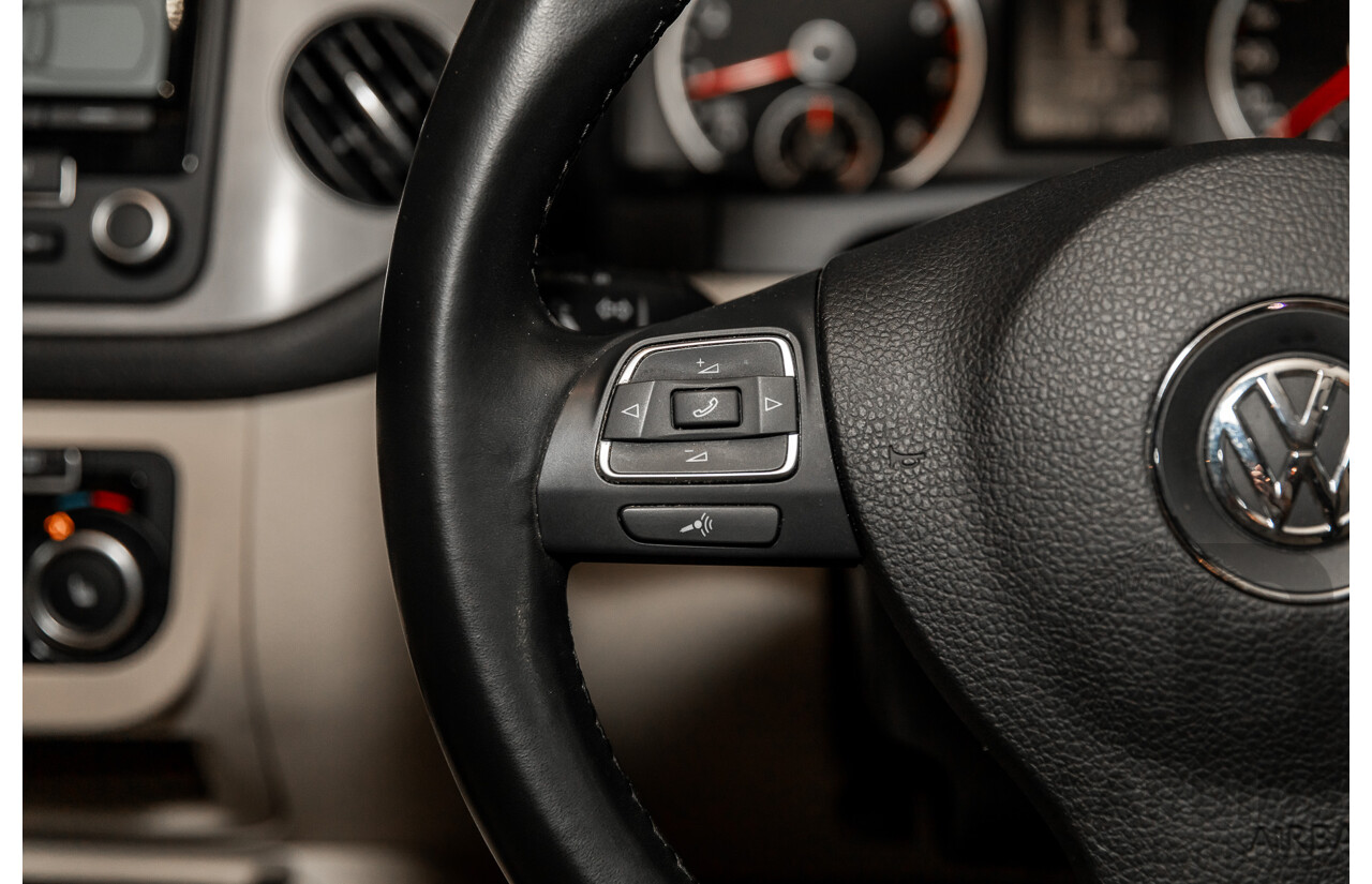 5/2011 Volkswagen Tiguan 125 TSI 5NC MY11 4d Wagon Deep Black Pearl Turbo 2.0L