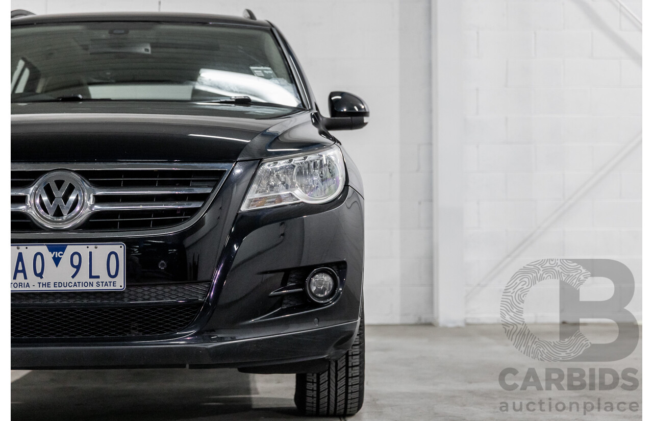 5/2011 Volkswagen Tiguan 125 TSI 5NC MY11 4d Wagon Deep Black Pearl Turbo 2.0L