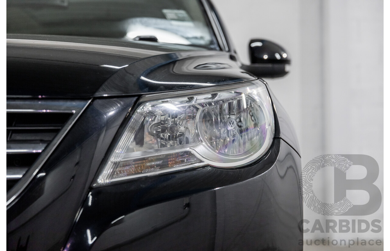 5/2011 Volkswagen Tiguan 125 TSI 5NC MY11 4d Wagon Deep Black Pearl Turbo 2.0L