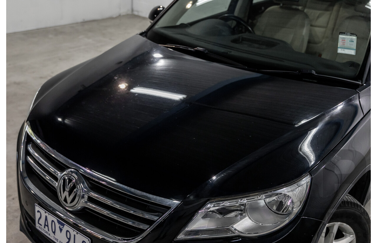 5/2011 Volkswagen Tiguan 125 TSI 5NC MY11 4d Wagon Deep Black Pearl Turbo 2.0L