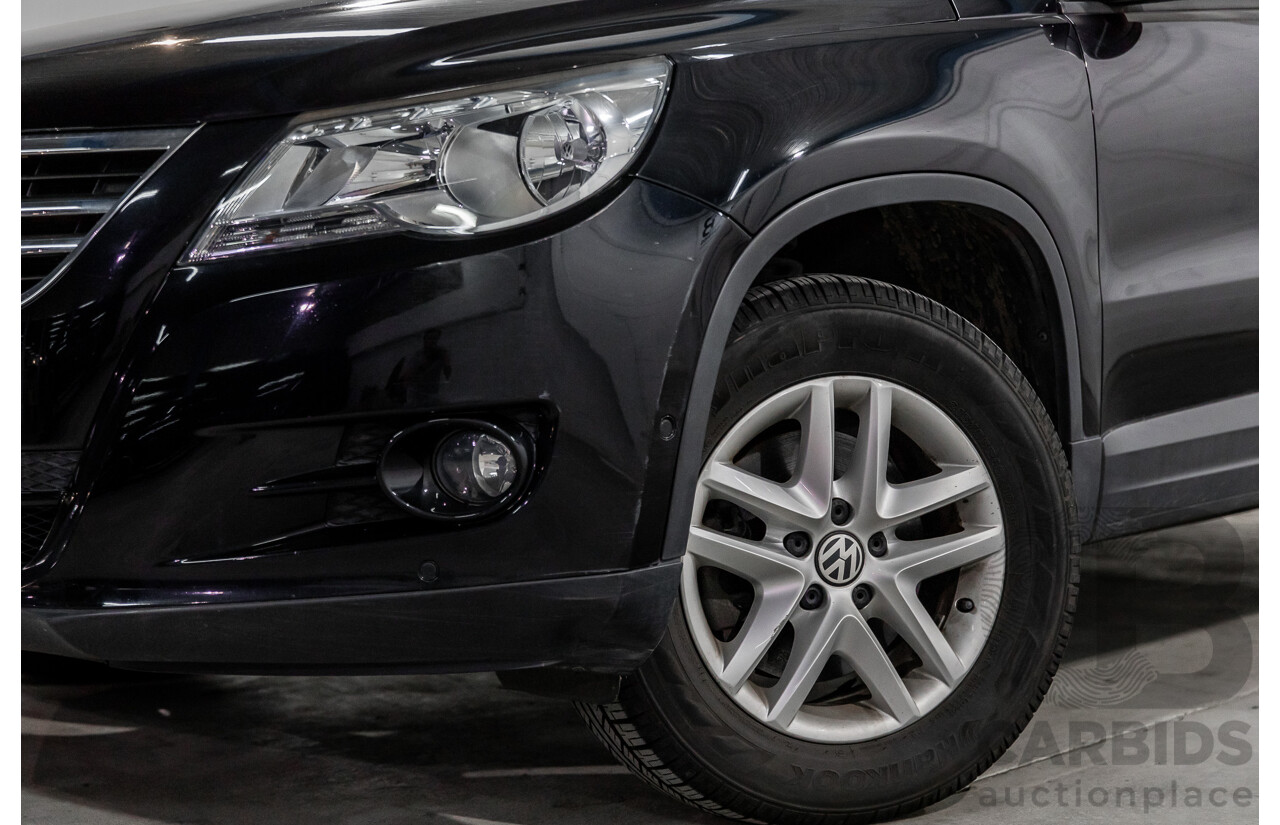 5/2011 Volkswagen Tiguan 125 TSI 5NC MY11 4d Wagon Deep Black Pearl Turbo 2.0L