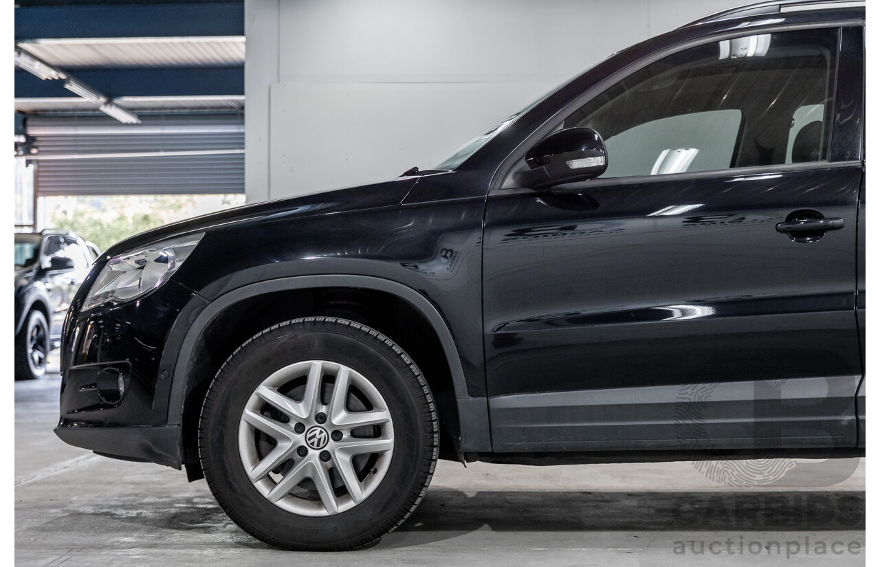 5/2011 Volkswagen Tiguan 125 TSI 5NC MY11 4d Wagon Deep Black Pearl Turbo 2.0L