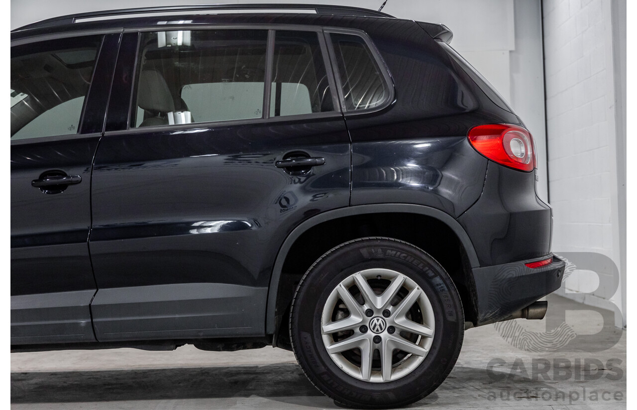 5/2011 Volkswagen Tiguan 125 TSI 5NC MY11 4d Wagon Deep Black Pearl Turbo 2.0L