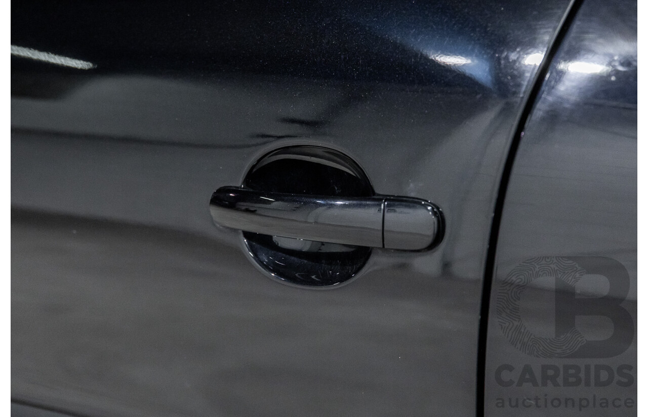 5/2011 Volkswagen Tiguan 125 TSI 5NC MY11 4d Wagon Deep Black Pearl Turbo 2.0L