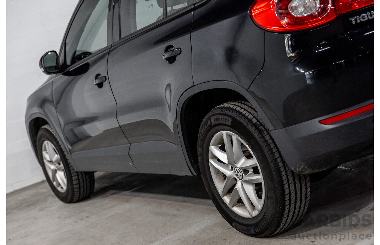 5/2011 Volkswagen Tiguan 125 TSI 5NC MY11 4d Wagon Deep Black Pearl Turbo 2.0L