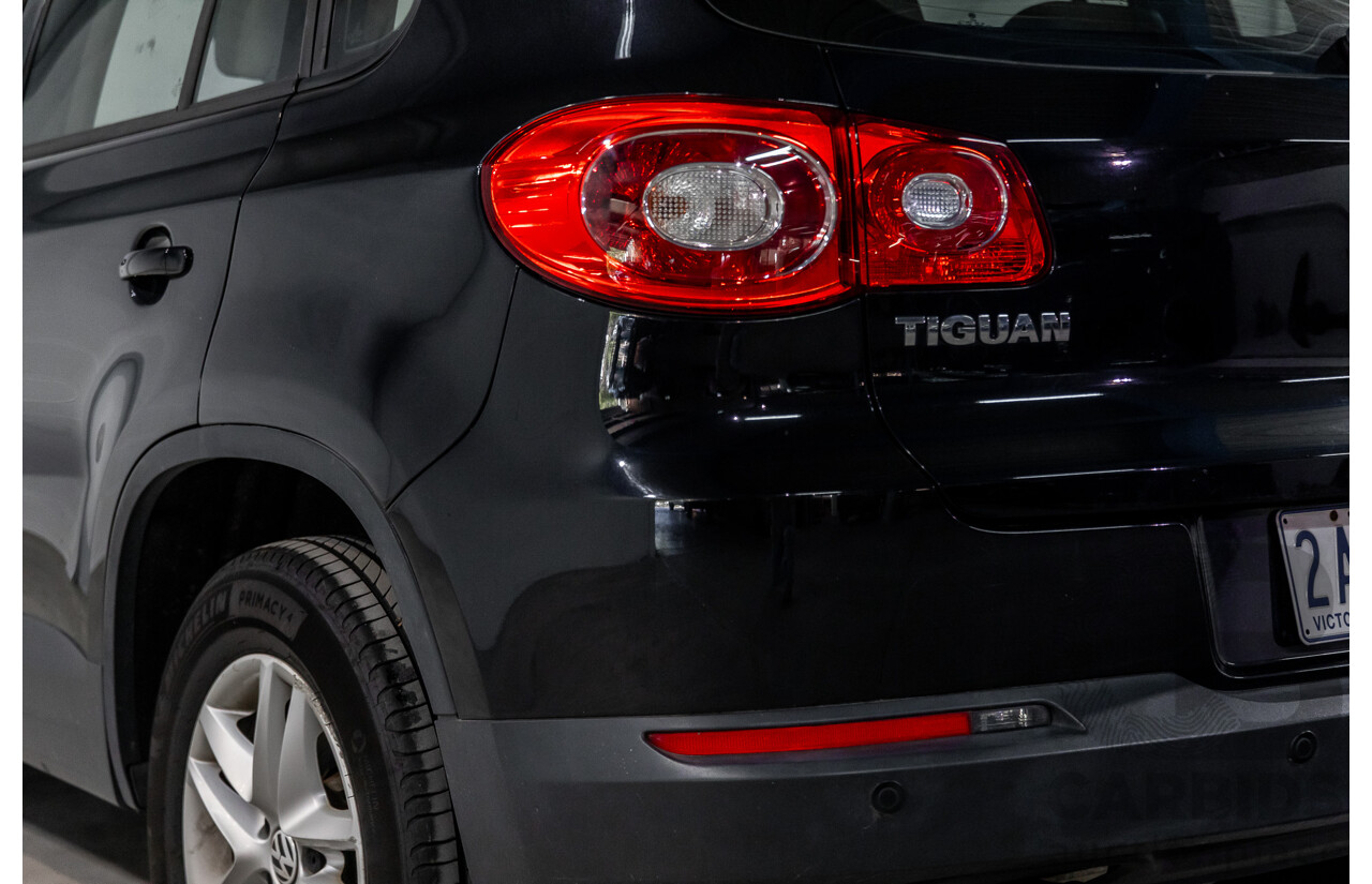 5/2011 Volkswagen Tiguan 125 TSI 5NC MY11 4d Wagon Deep Black Pearl Turbo 2.0L