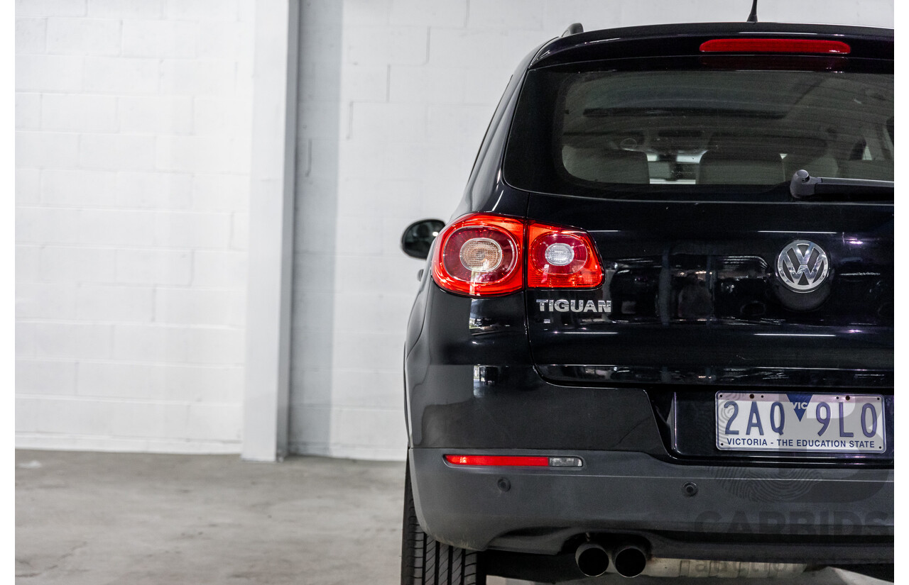 5/2011 Volkswagen Tiguan 125 TSI 5NC MY11 4d Wagon Deep Black Pearl Turbo 2.0L
