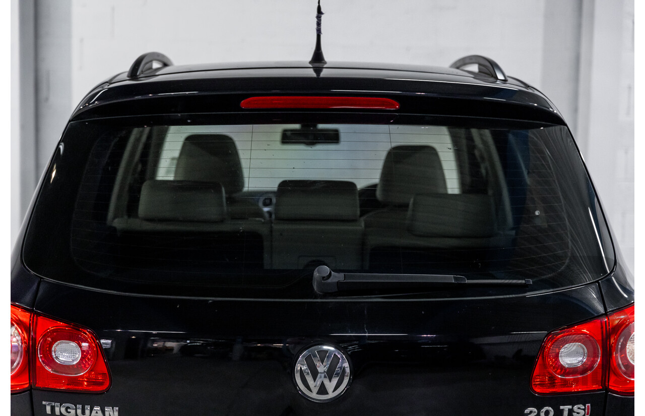 5/2011 Volkswagen Tiguan 125 TSI 5NC MY11 4d Wagon Deep Black Pearl Turbo 2.0L