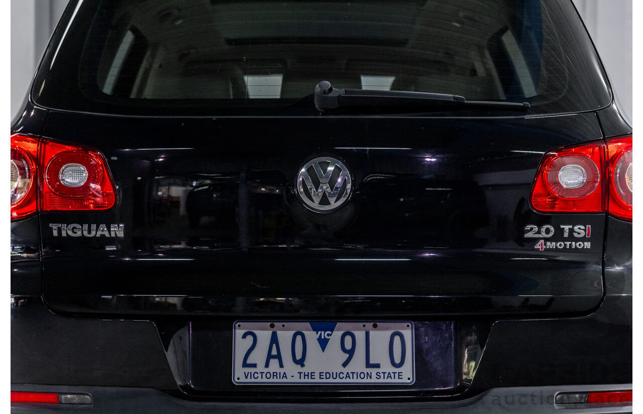 5/2011 Volkswagen Tiguan 125 TSI 5NC MY11 4d Wagon Deep Black Pearl Turbo 2.0L