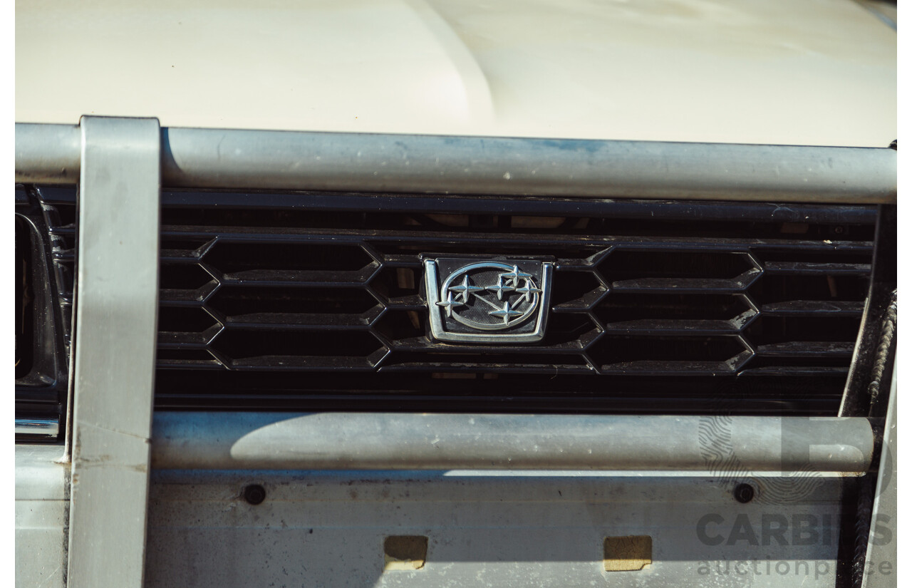 11/1991 Subaru Brumby Special GL (4x4)  P/Up Beige 1.8L