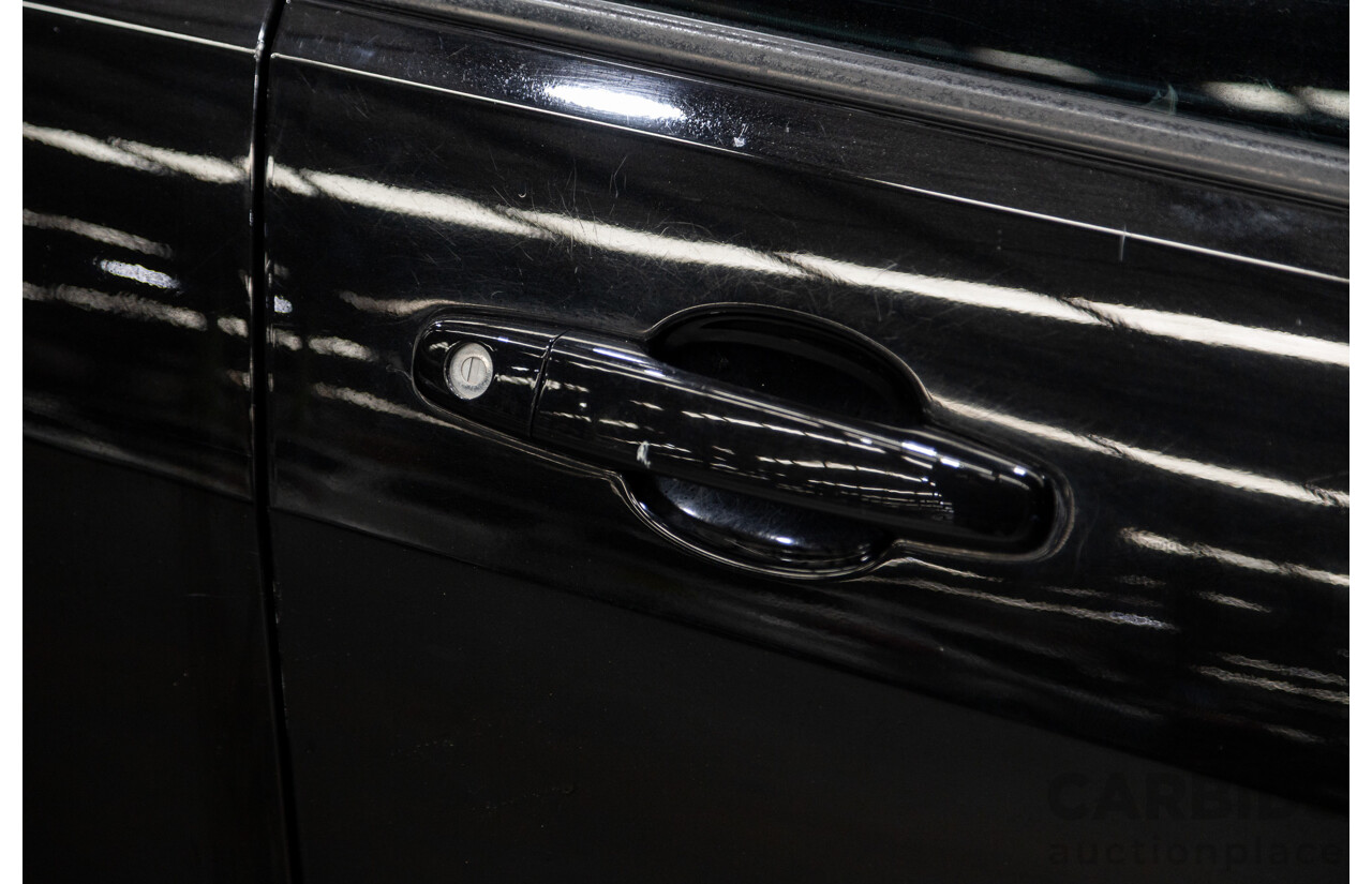 11/2010 Holden Commodore SV6 VE II Utility Black 3.6L